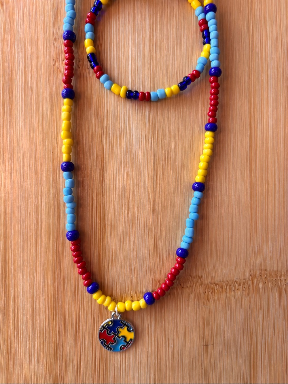 Multicolor Autism Awareness Beaded Necklace with Puzzle Charm - Blue/Yellow/Red